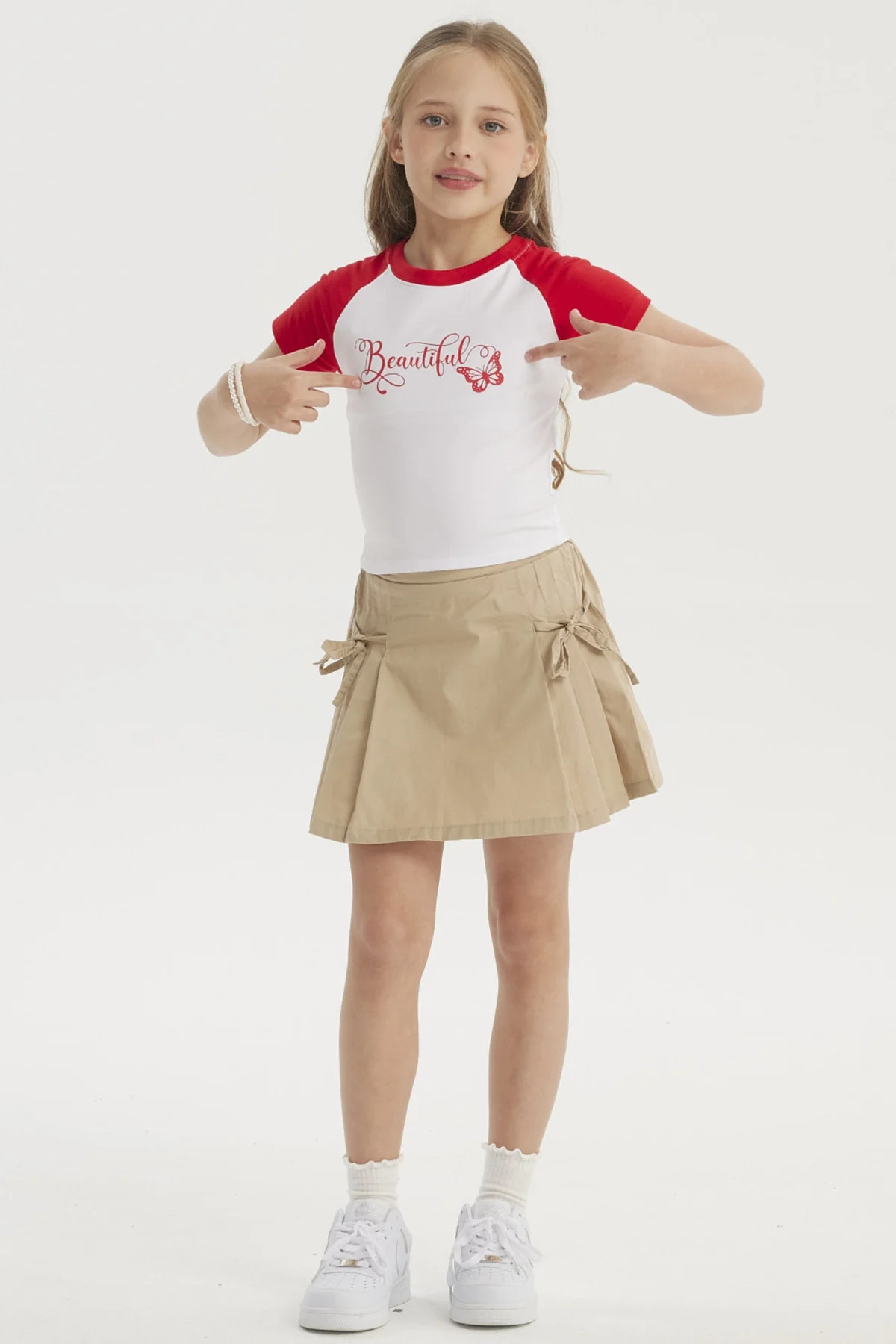 Falda Niña Pliegues Laterales Beige - Image 4