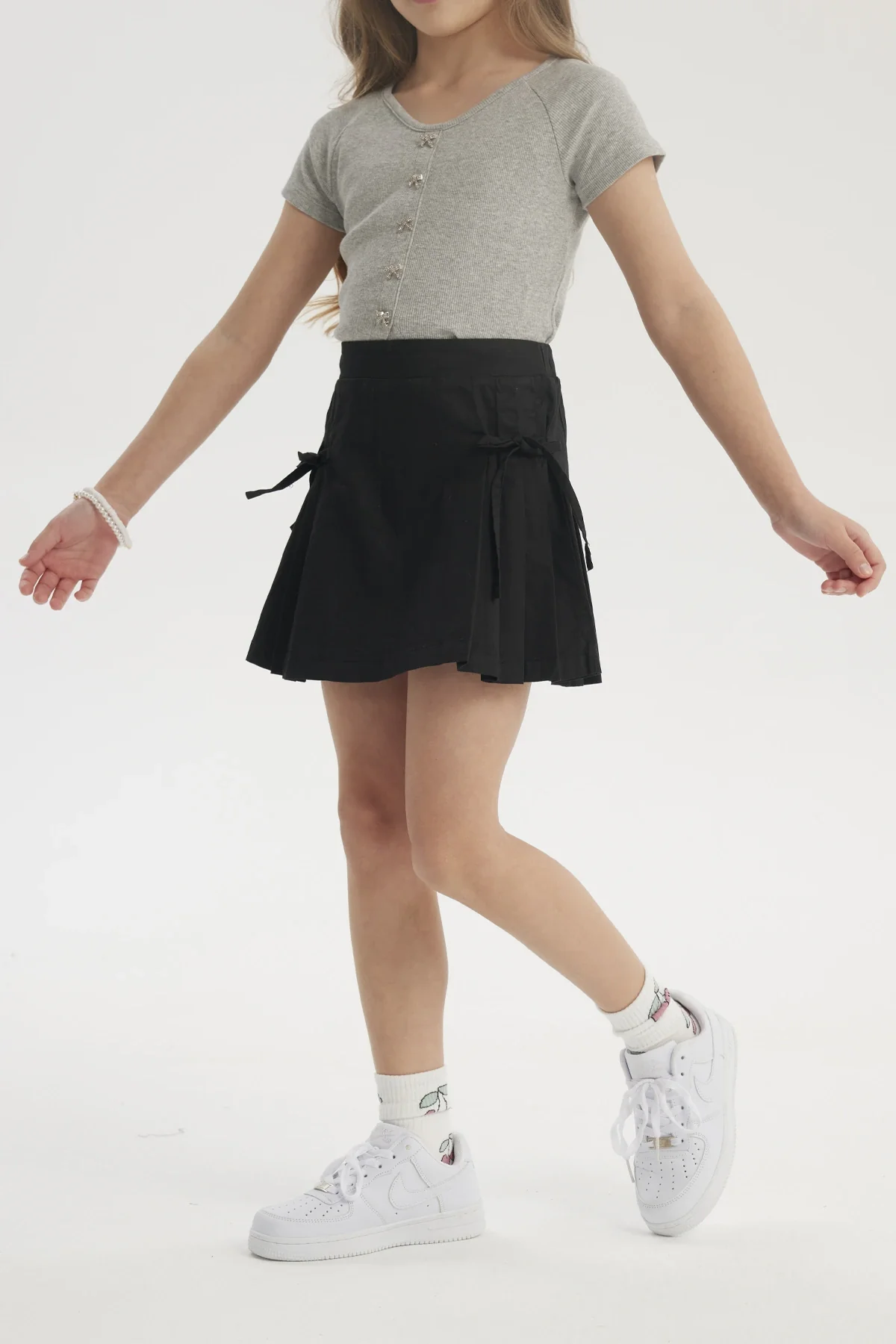 Falda Niña Pliegues Laterales Negro - Image 3
