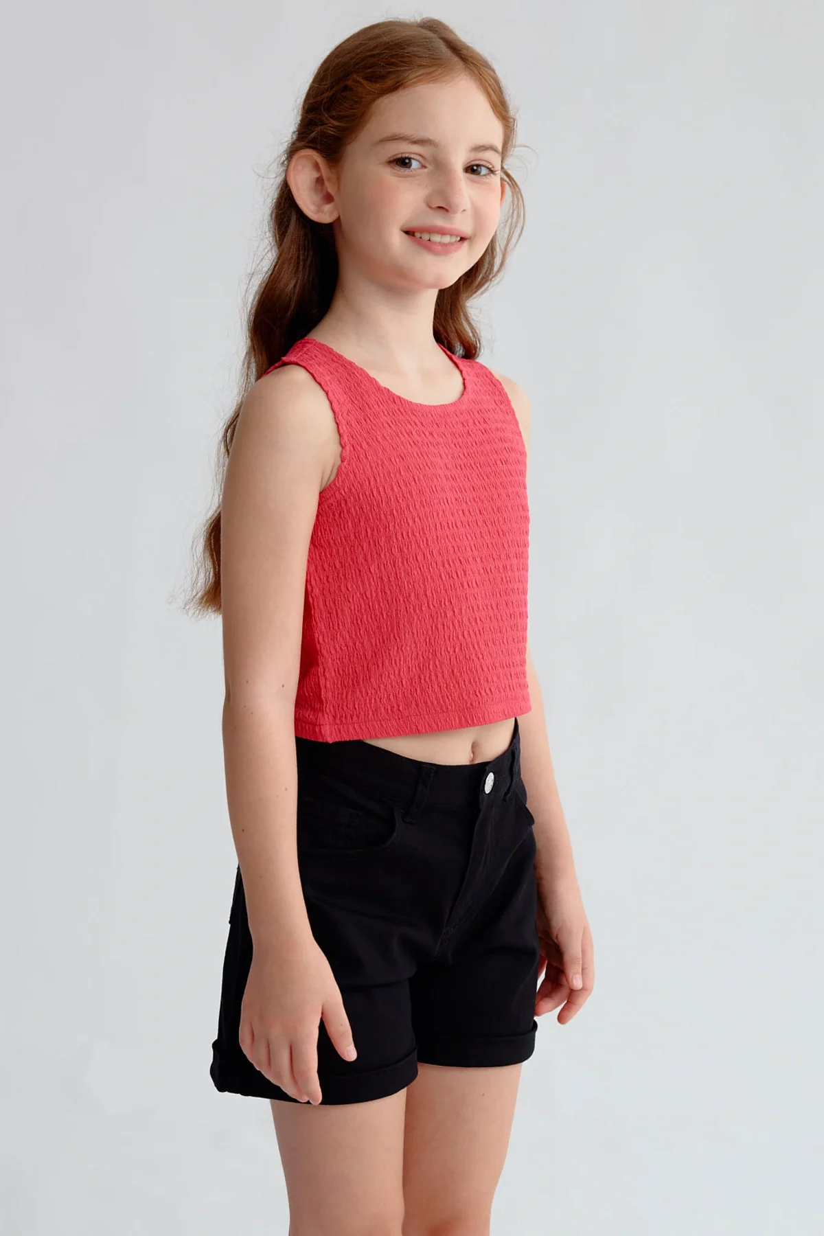 Polera Niña Textura Tipo Peto Fucsia - Image 2